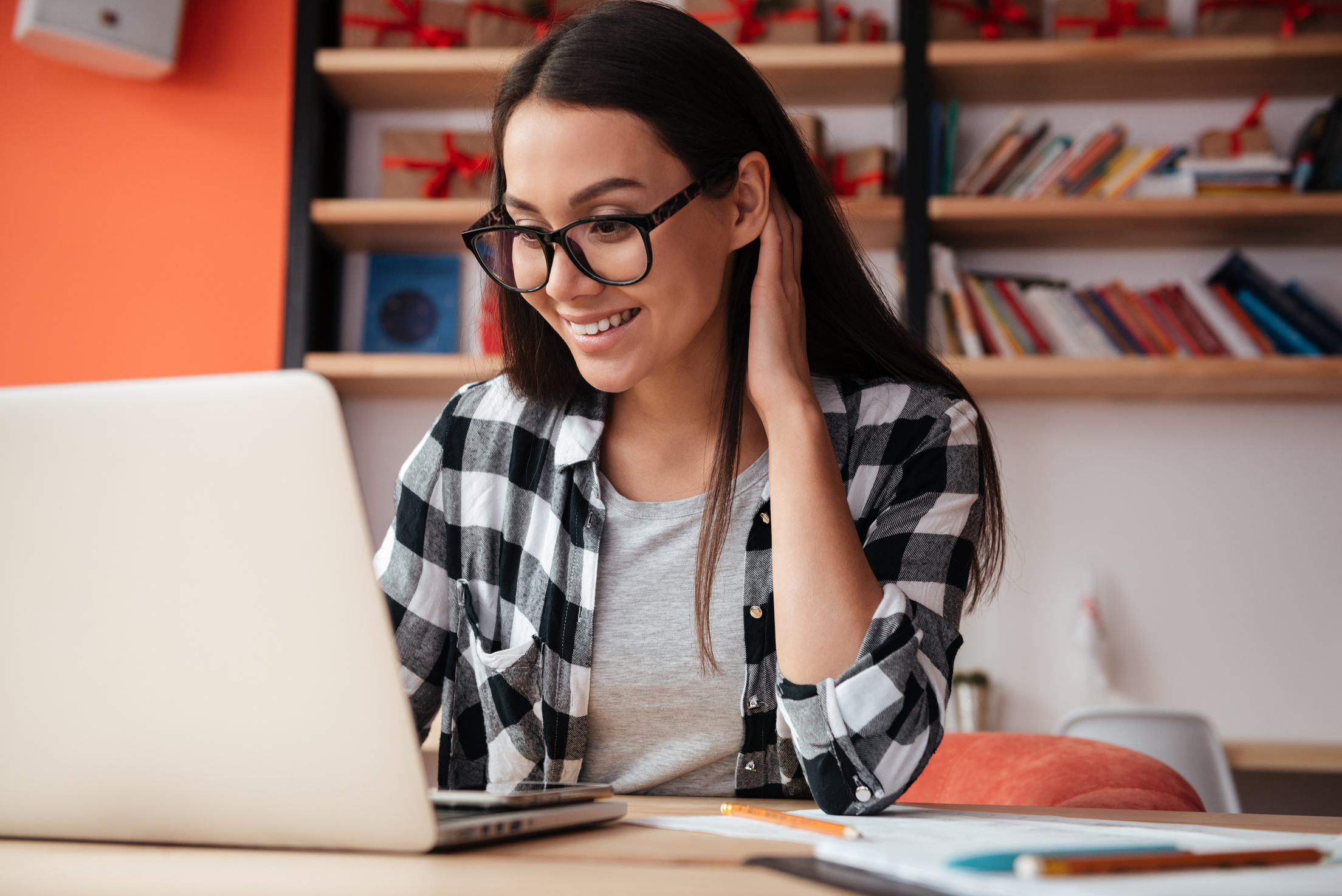 Pretty Young Woman Using Laptop Computer