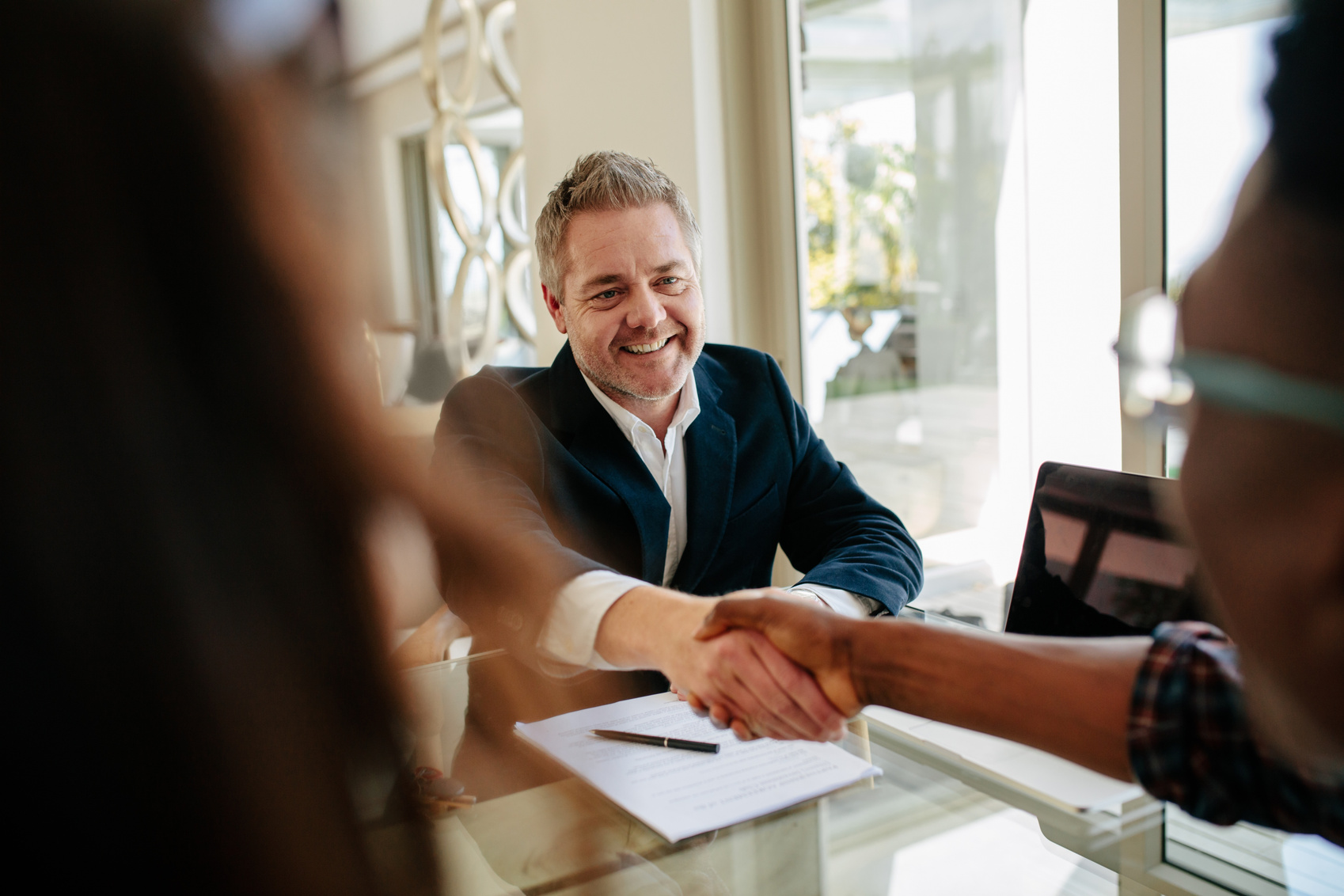 Realtor Congratulating New Property Owners